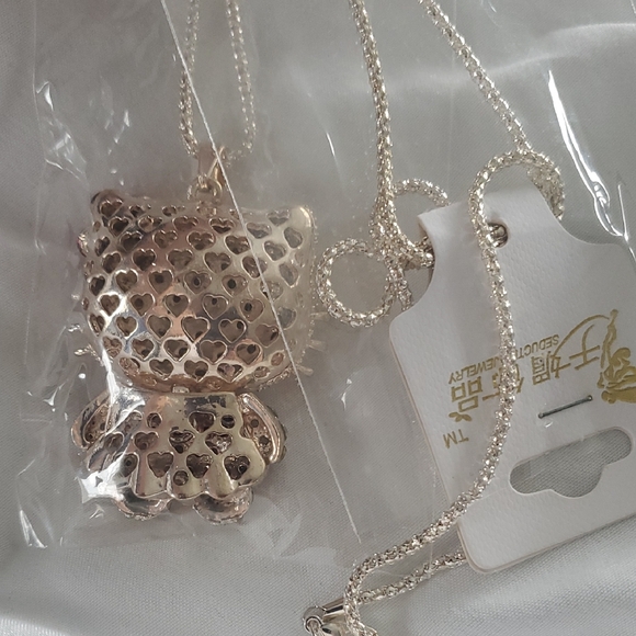 Sparkling Crystal Cat Pendant with Red Accents - Picture 5 of 7